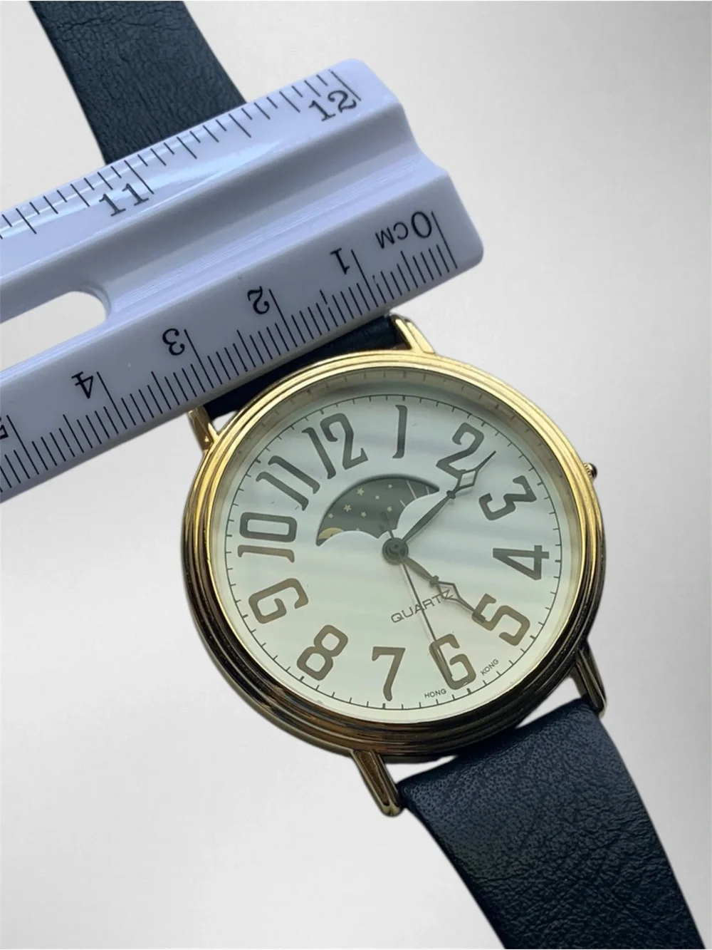 Classic Black Leather Gold-Tone Quartz Watch with Moonphase Dial, Unisex